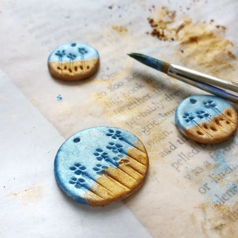 Create beautiful jewelry with air dry clay!  Get the full tutorial in this post.